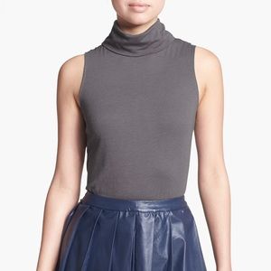 Tildon back zip sleeveless turtleneck top